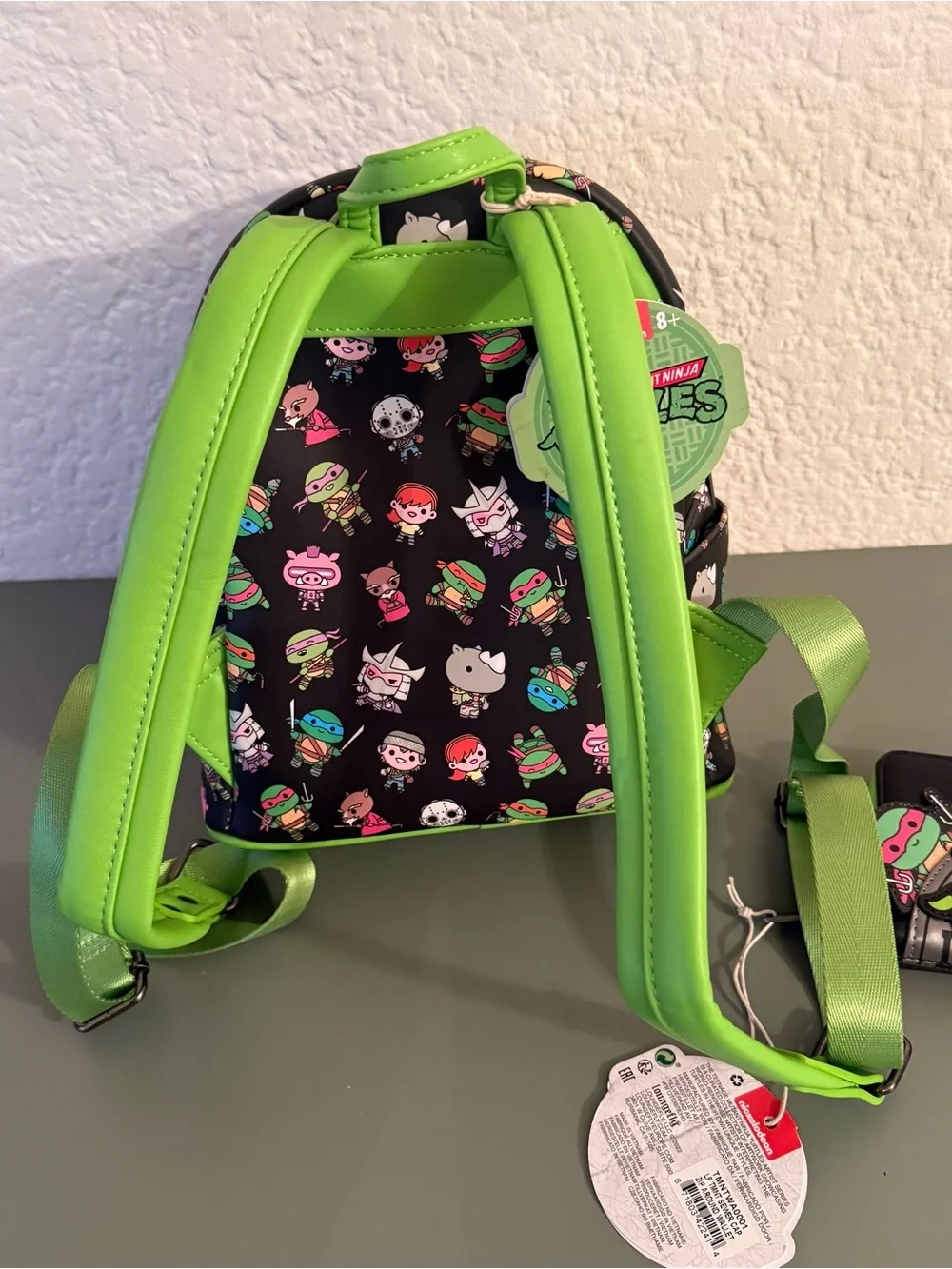 Loungefly: Teenage Mutant Ninja Turtles Sewer Cap AOP Mini Backpack and Wallet